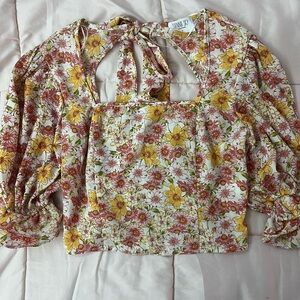 Cute floral semi open back blouse